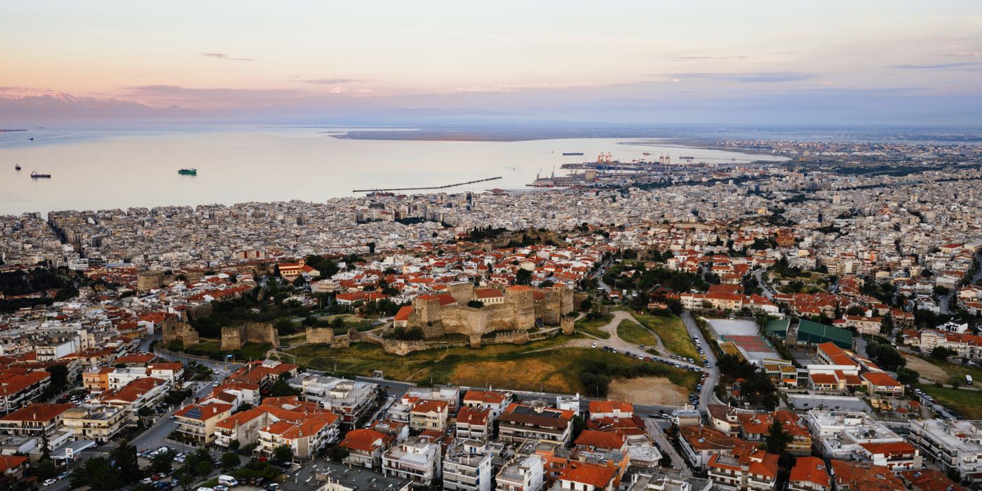 Aerial view of Thessaloniki Greece and its curved waterfront at sunset