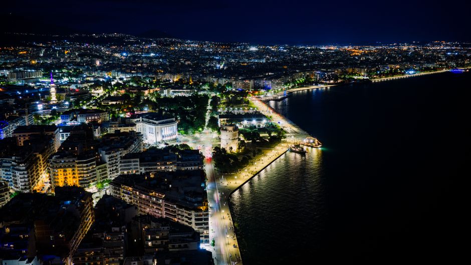 Ultimate Private Helicopter Transfer from Kea to Athens Review: Skip the Ferry and Fly in Style Review 2026 - Stunning aerial night view of Thessaloniki's illuminated waterfront in Greece.