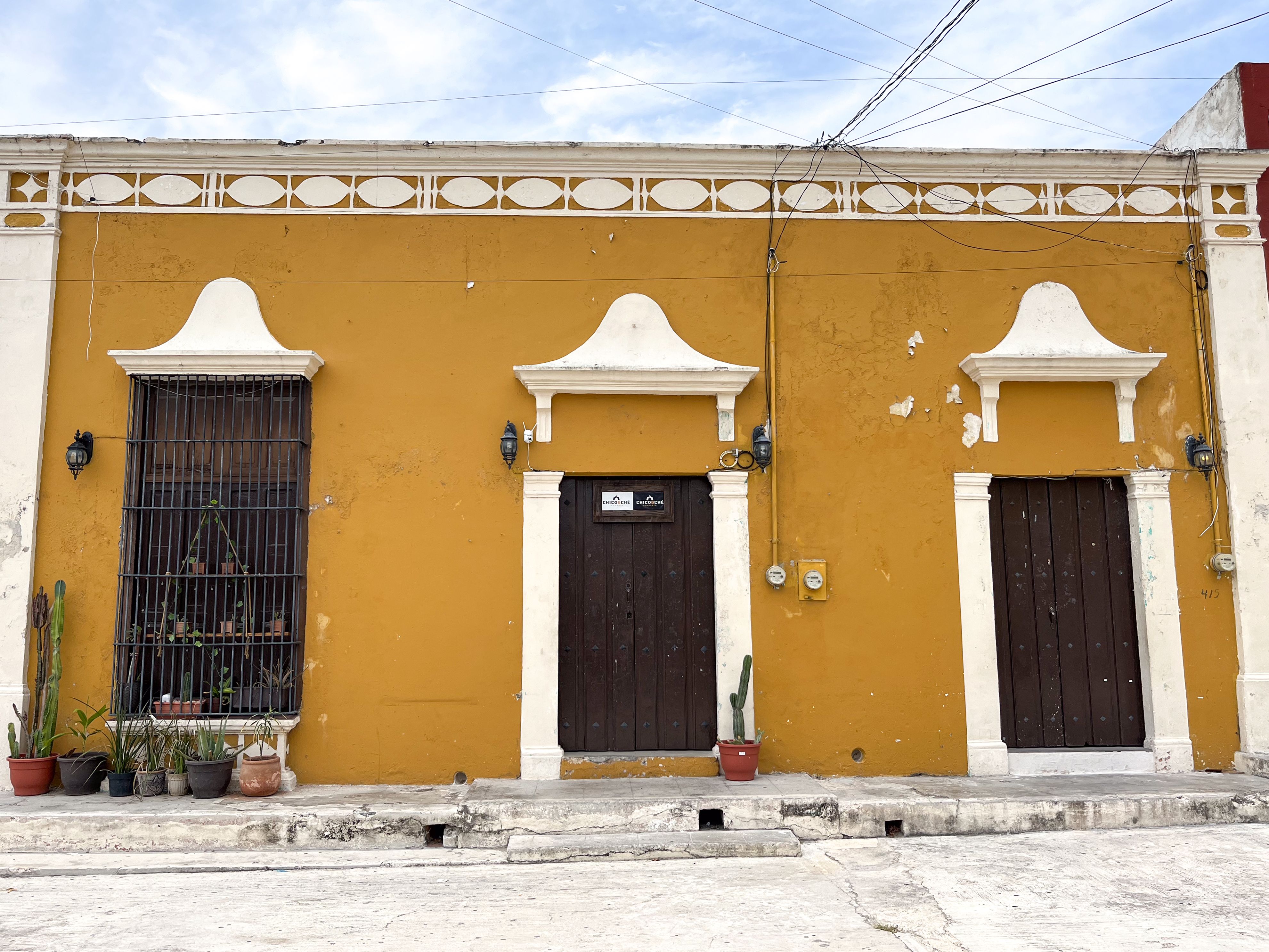 Colonial architecture in San Francisco de Campeche. Vibrant orange facade with Mexican charm. - Campeche