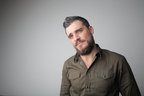 Man in Brown Button Up Shirt