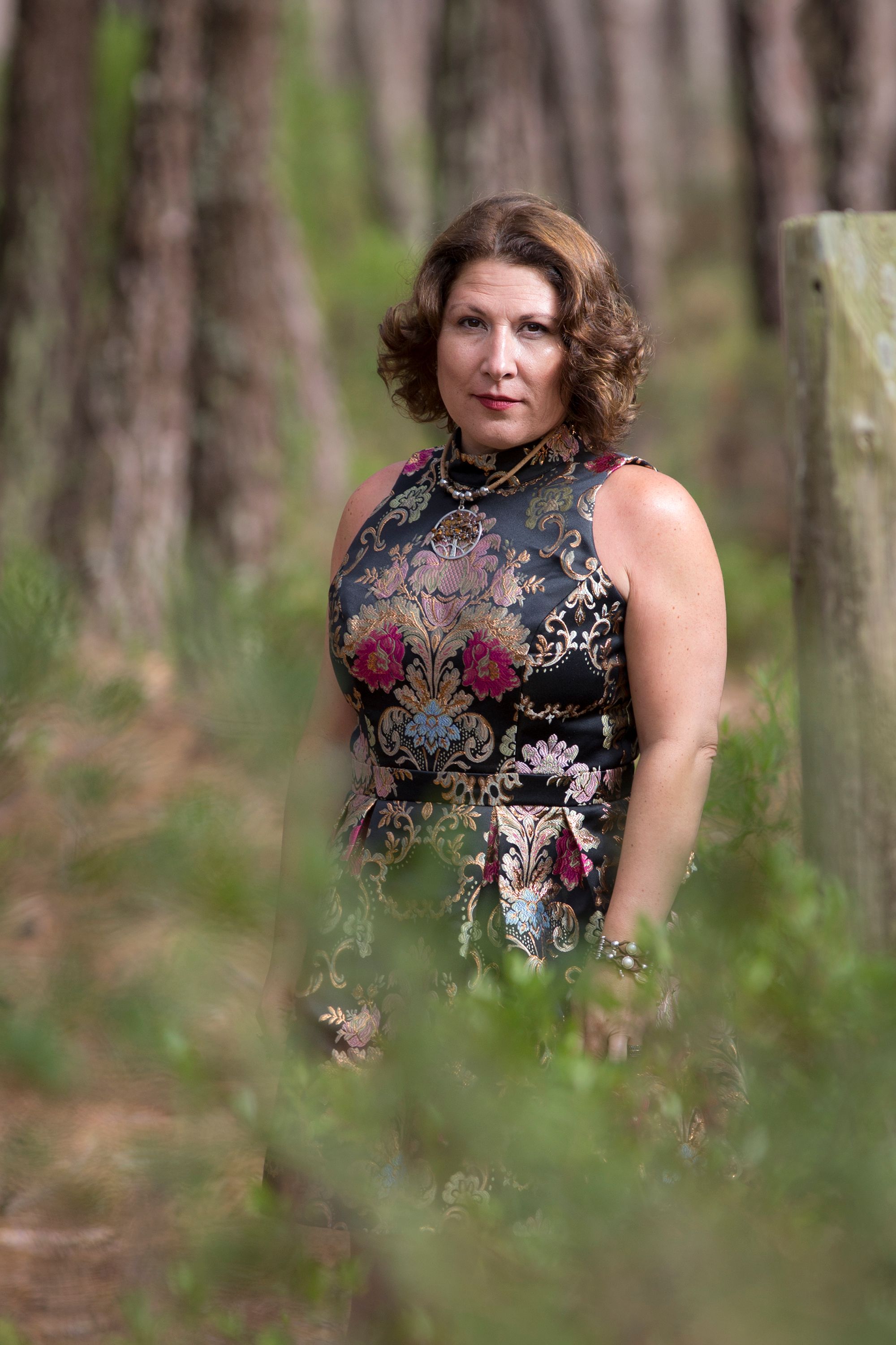 Elegant Woman Posing in Forest Setting · Free Stock Photo
