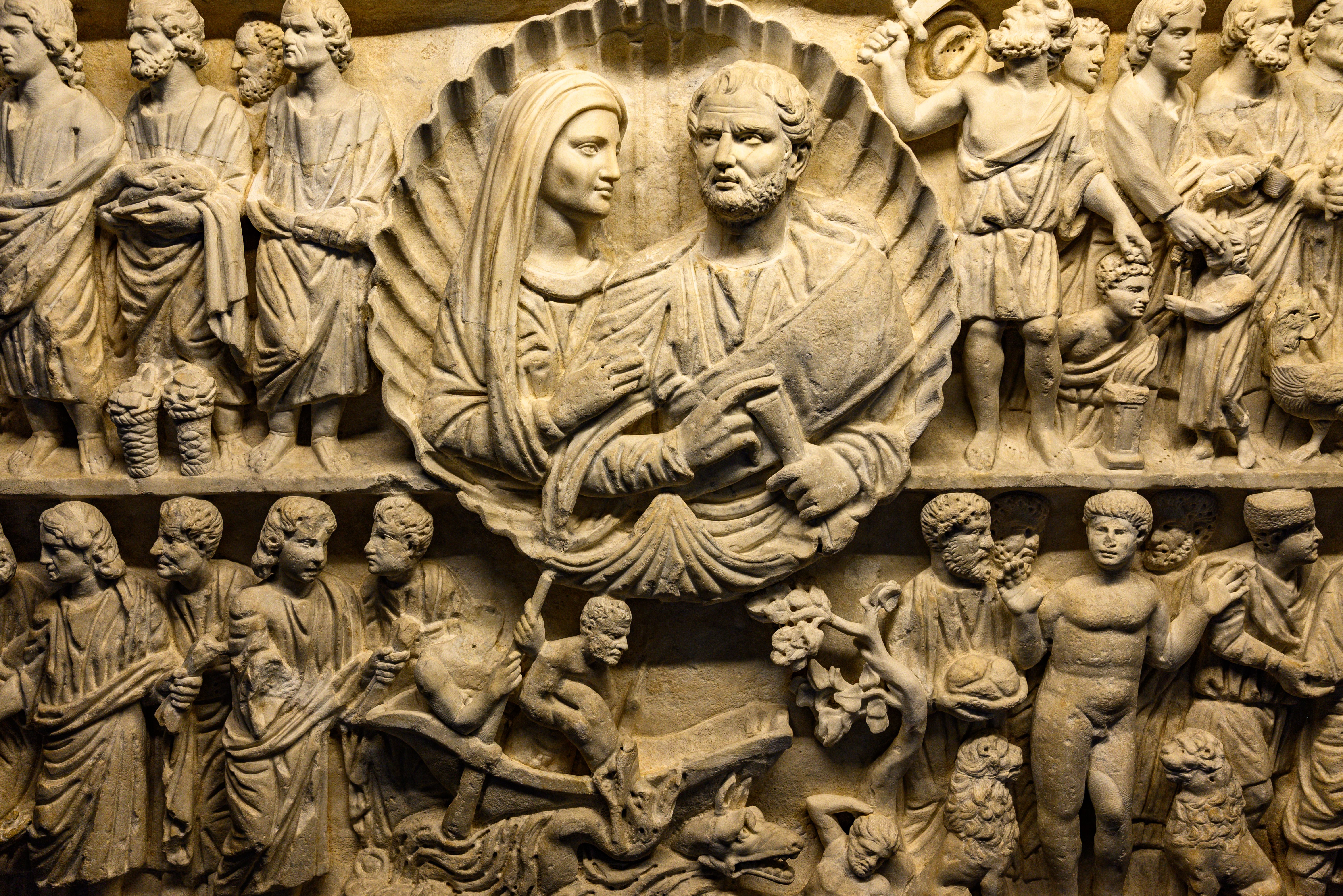 Intricate ancient Roman sarcophagus relief sculpture displayed in Vatican City.