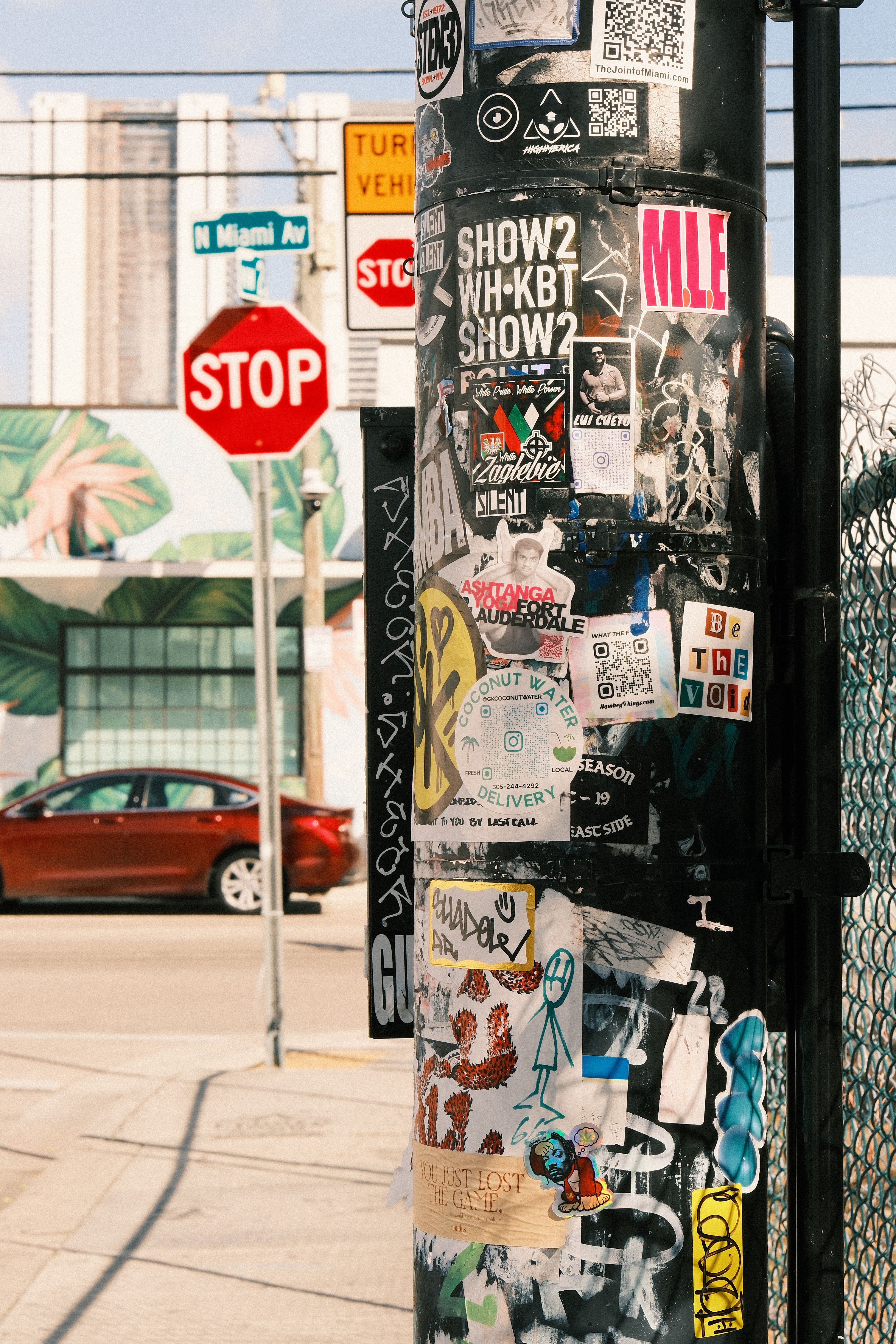 Pink Sticker on Back of Street Sign · Free Stock Photo