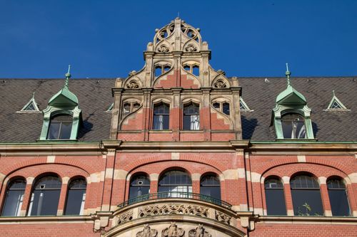 Free Front view of a historic warehouse building in Hamburg, showcasing detailed architecture. Stock Photo