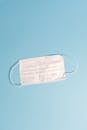 Face Mask on Blue Background