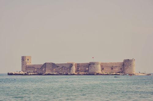 Free Historical Maiden's Castle in the Mediterranean Sea, Turkey, offering a serene and classic view. Stock Photo