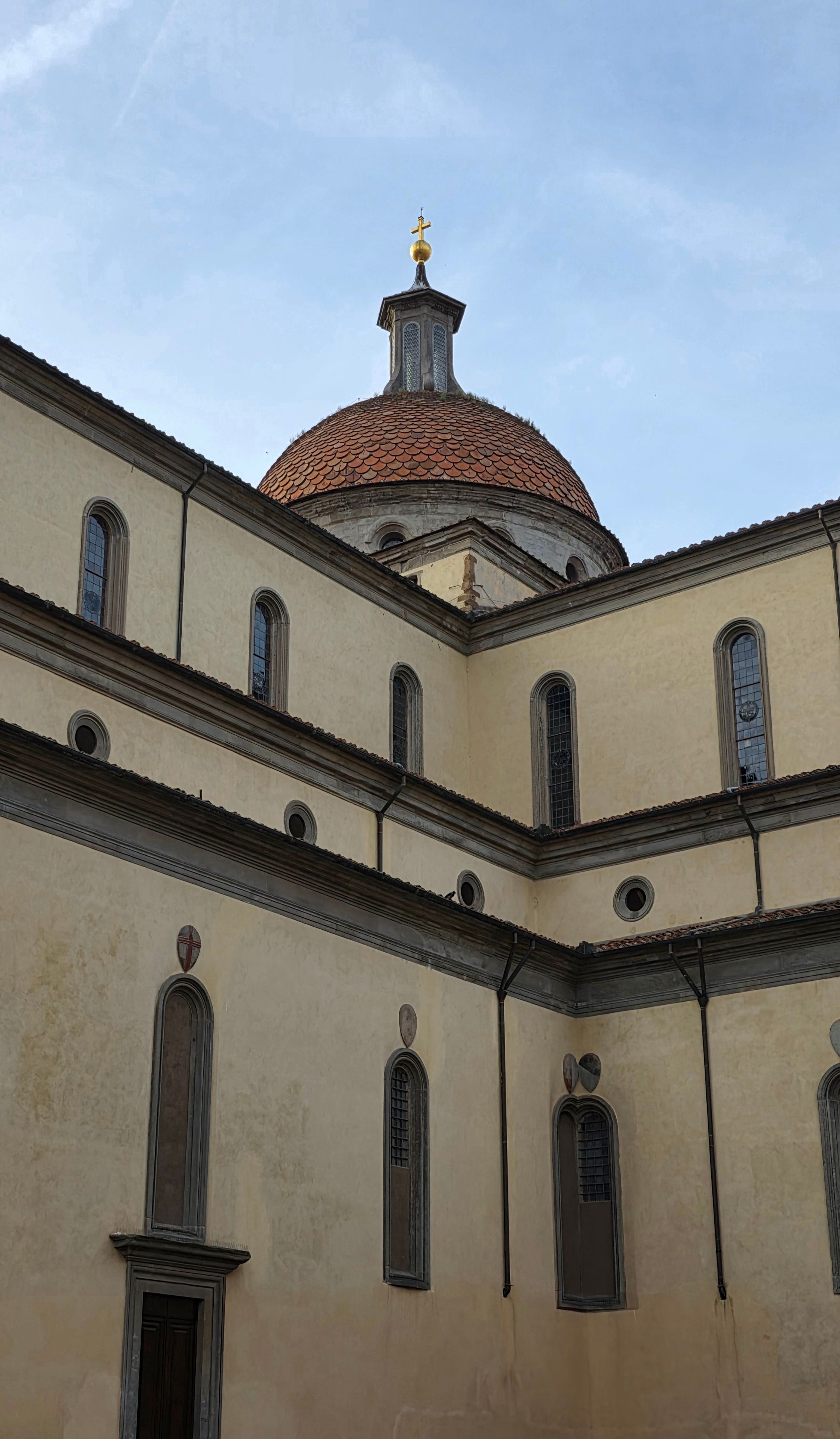 View of a historic Renaissance building with a dome in Florence, Italy.