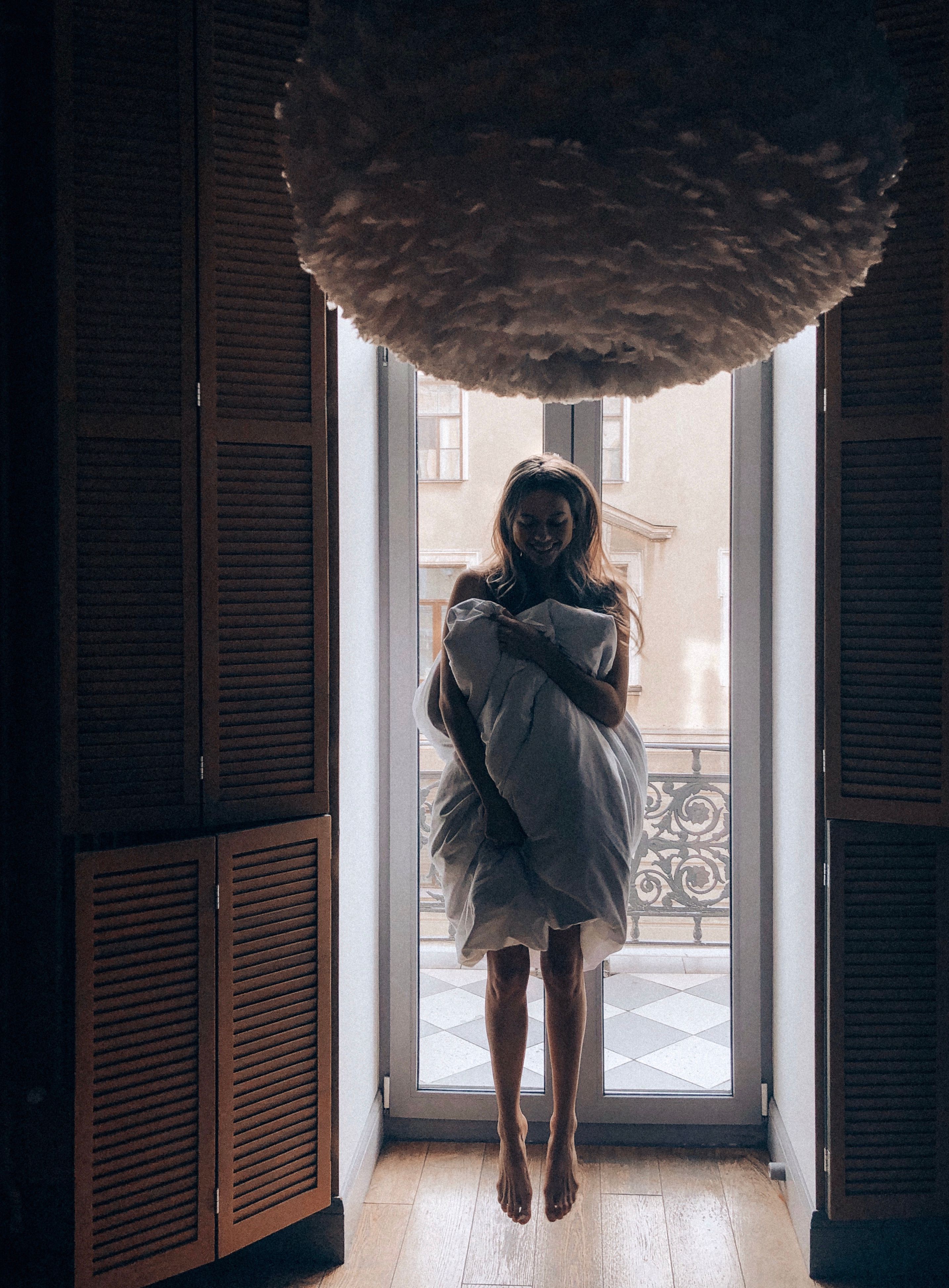 Woman Covering Herself With a Pillow