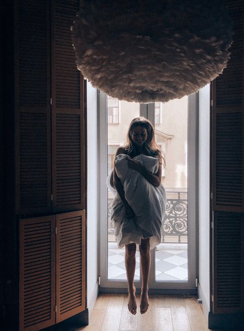 Woman Covering Herself With a Pillow