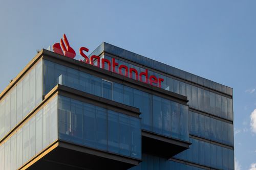 Free Exterior view of the modern Santander building in Puebla, Mexico, under a clear blue sky. Stock Photo
