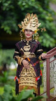 Portrait of a woman in traditional Indonesian costume showcasing cultural heritage. - Fotografer Sidoarjo
