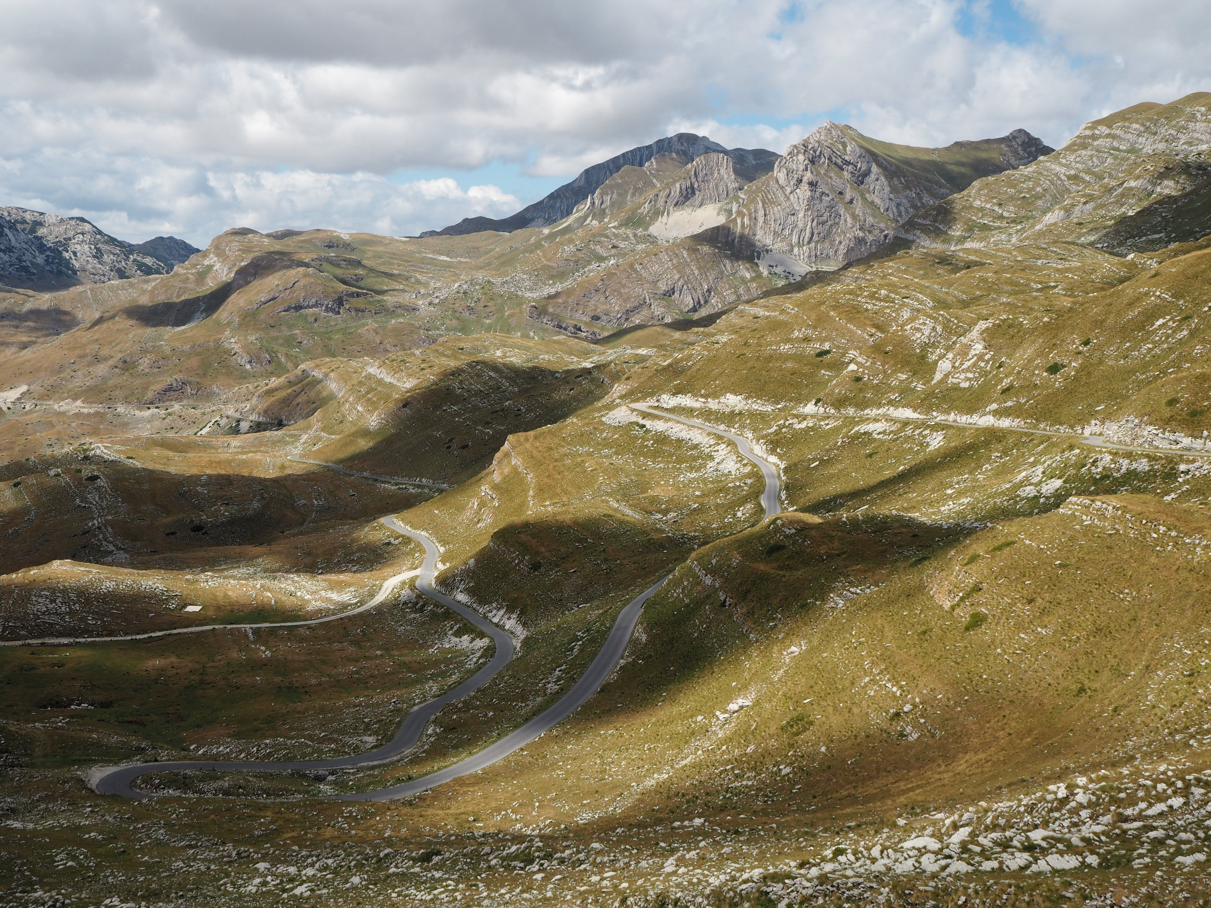 Discover rugged beauty in Montenegro's Durmitor mountains with winding roads and wild, untouched nature.