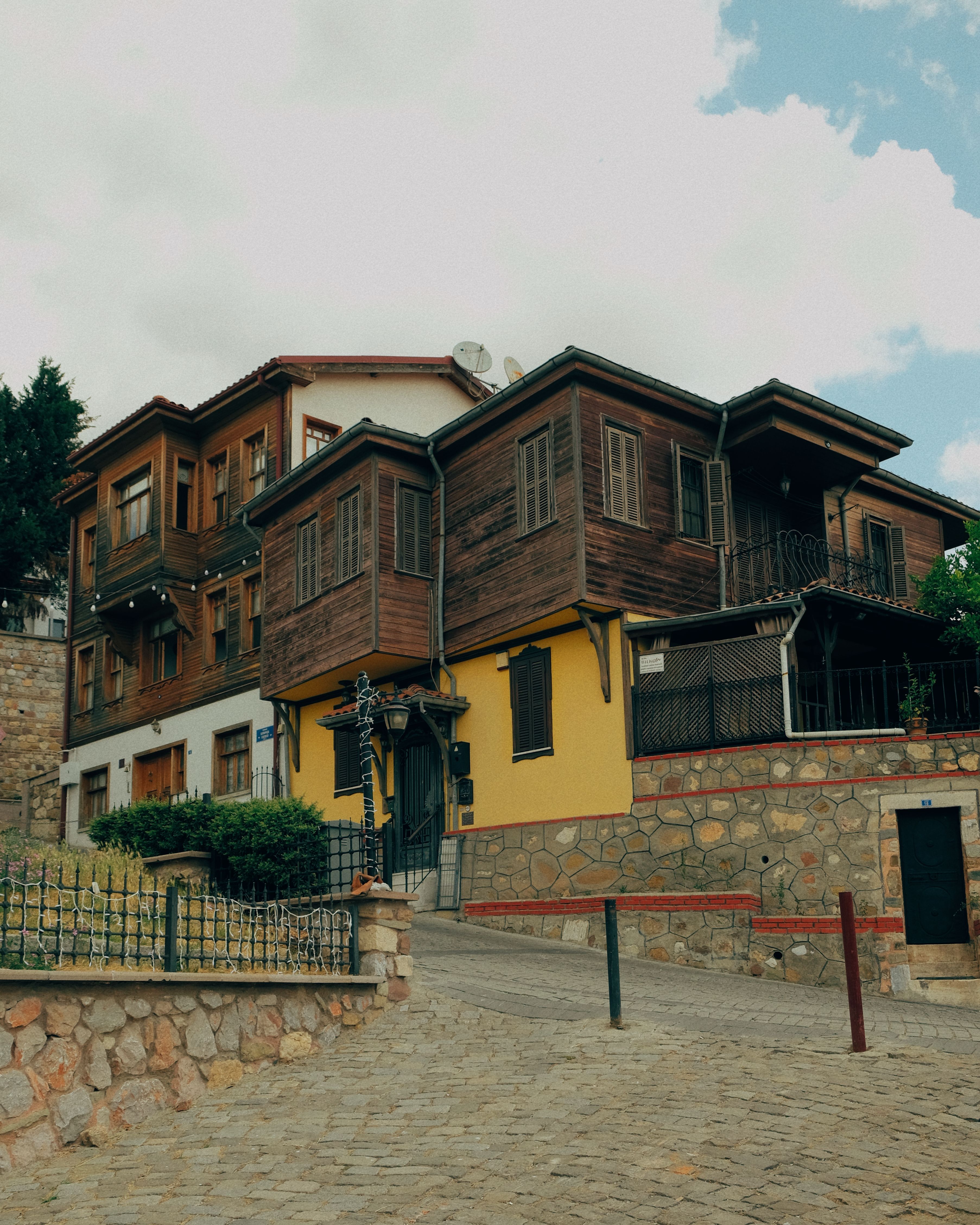 Charming traditional houses in İzmit, displaying classic Ottoman architecture style with wooden and stone elements.