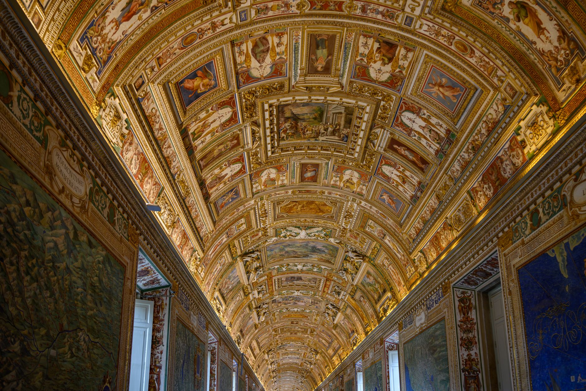Stunning view of the ornately decorated ceiling in the Vatican Museums, a hallmark of Renaissance art.