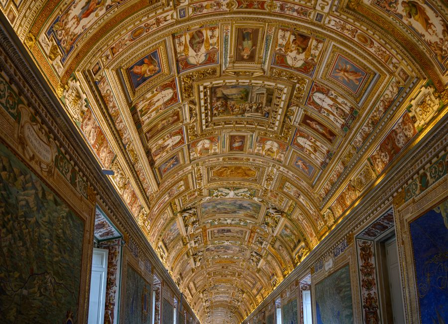 Stunning view of the ornately decorated ceiling in the Vatican Museums, a hallmark of Renaissance art.
