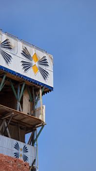Unique architectural rooftop design against a clear blue sky in Egypt.