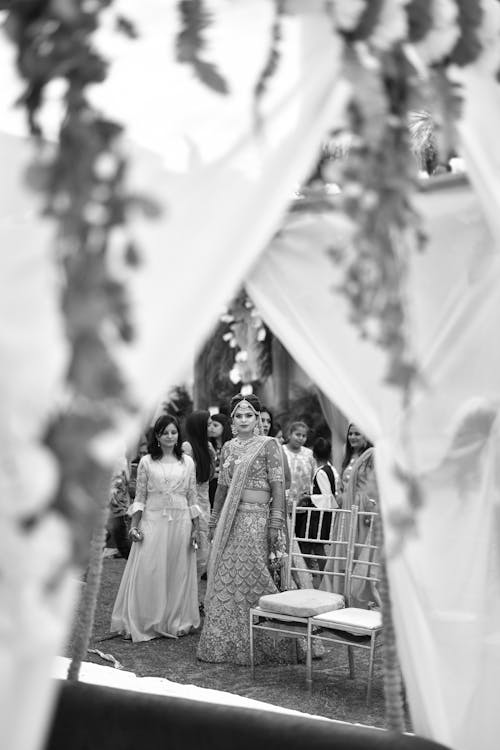 Grayscale Photo of Woman in White Wedding Dress