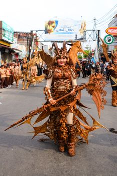 Vibrant traditional parade with elaborate costumes in West Java, Indonesia. - Fotografer Sidoarjo