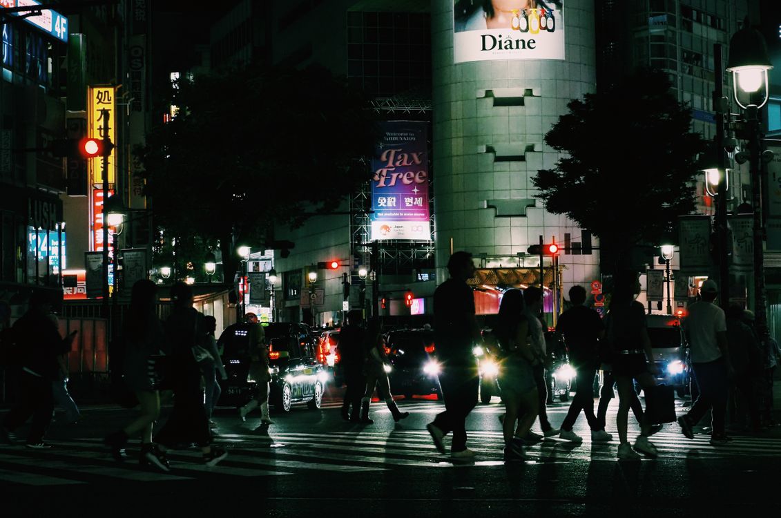 Vibrant Night Scene at Tokyo's Shibuya Crossing · Free Stock Photo