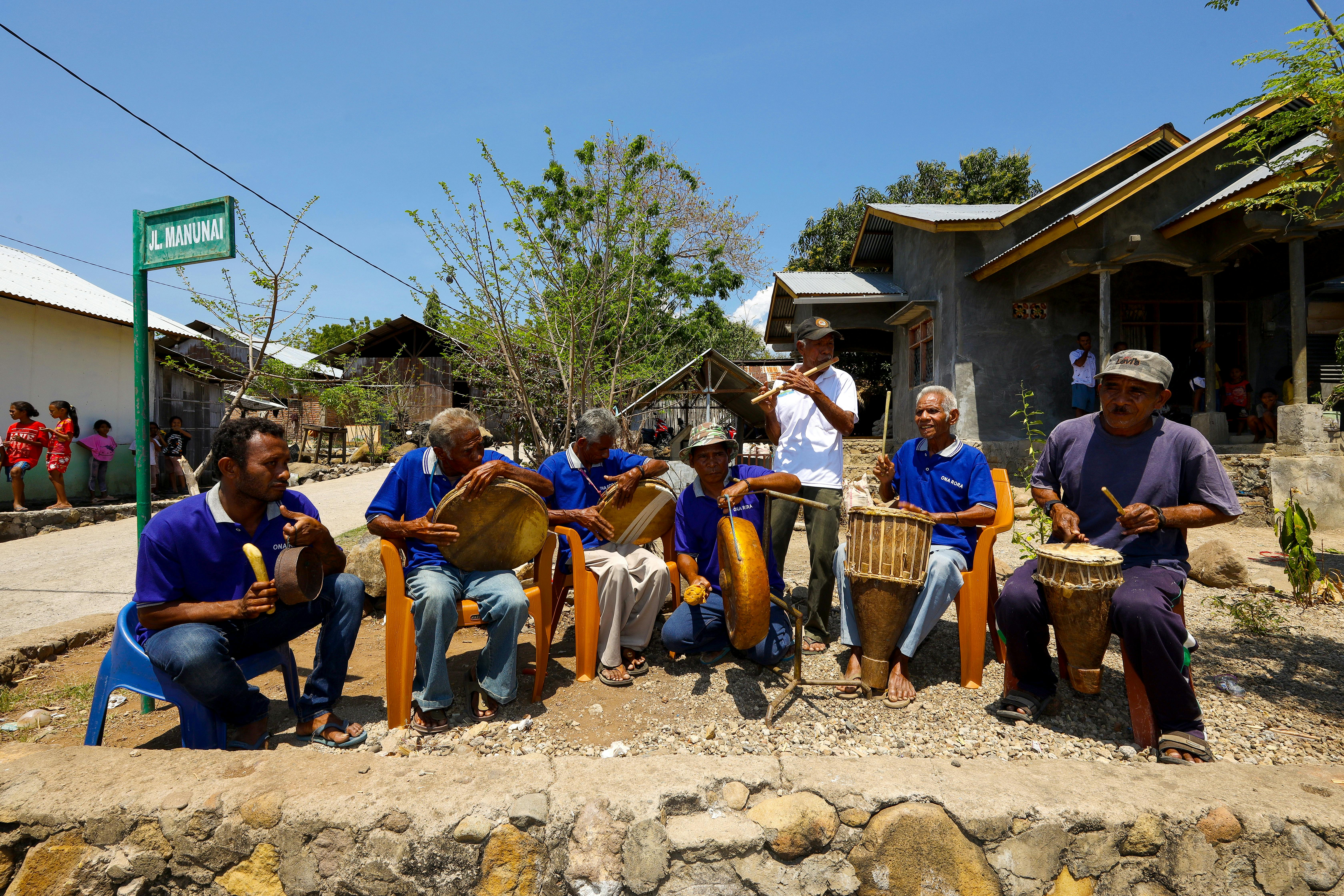 A lively traditional music performance in Maumere, East Nusa Tenggara, showcasing local musicians.