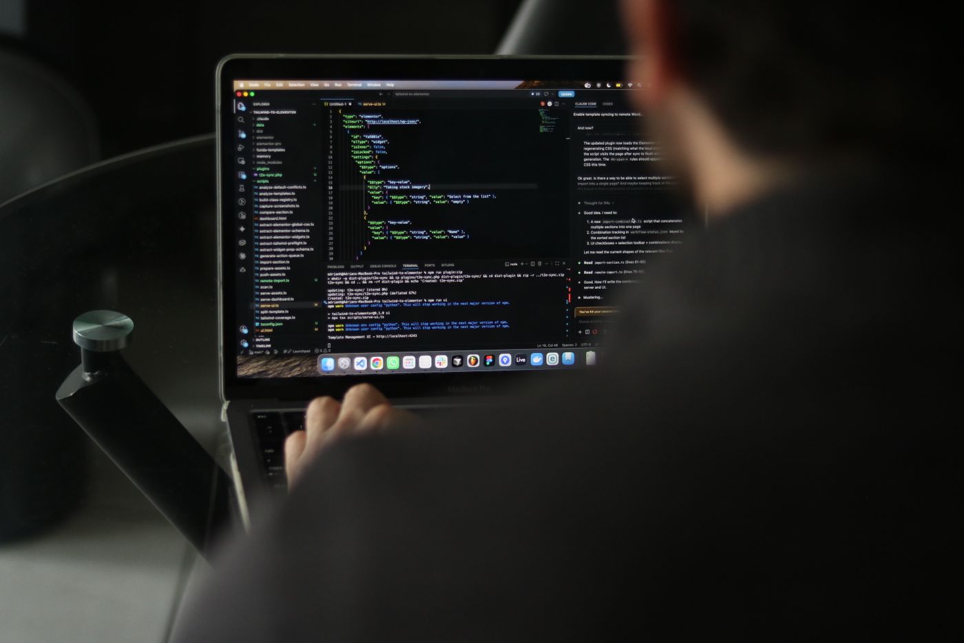 Laravel developer writing code on professional setup