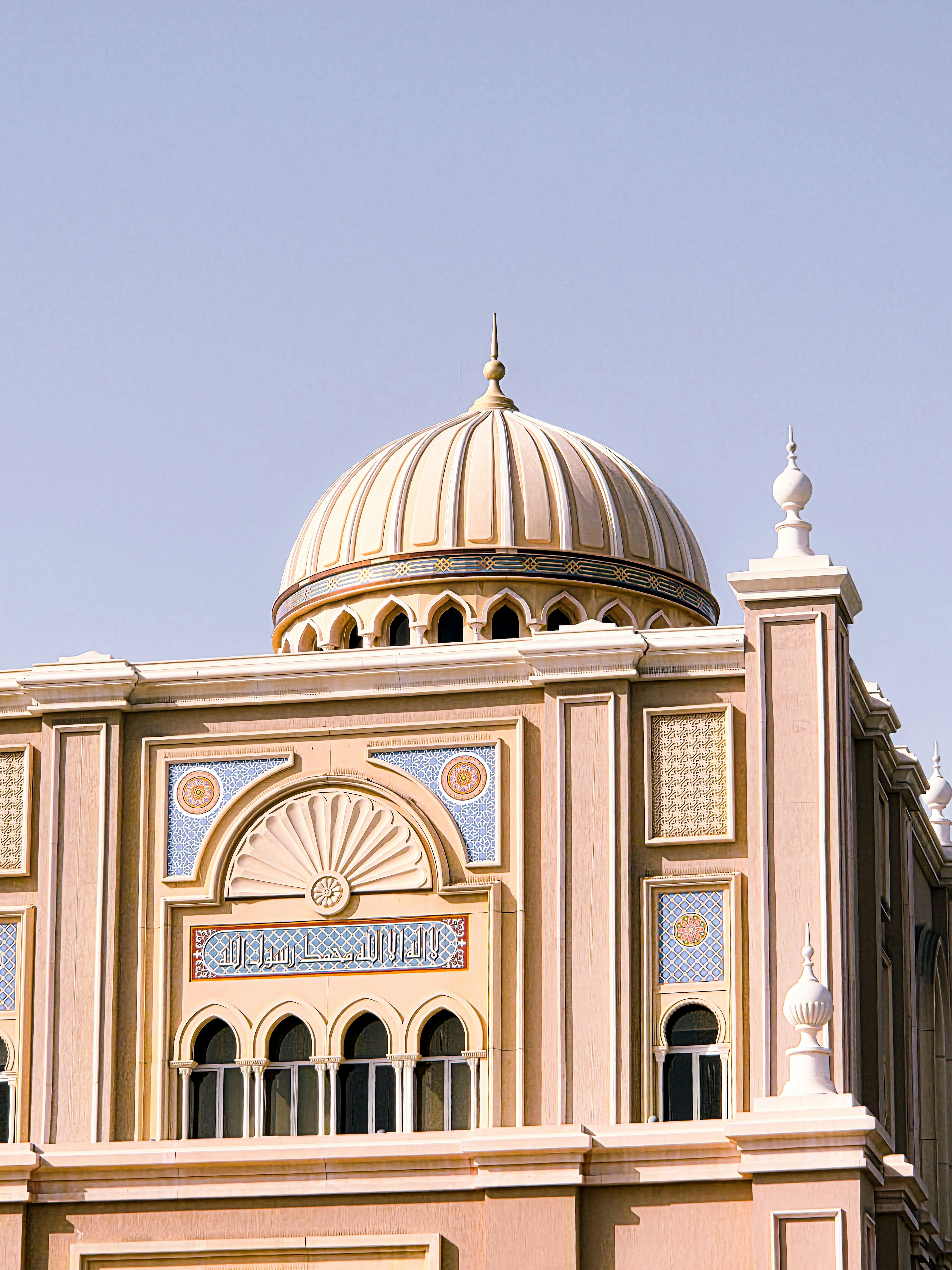 Beautiful example of ornate architecture with domed roof in Sharjah, United Arab Emirates.