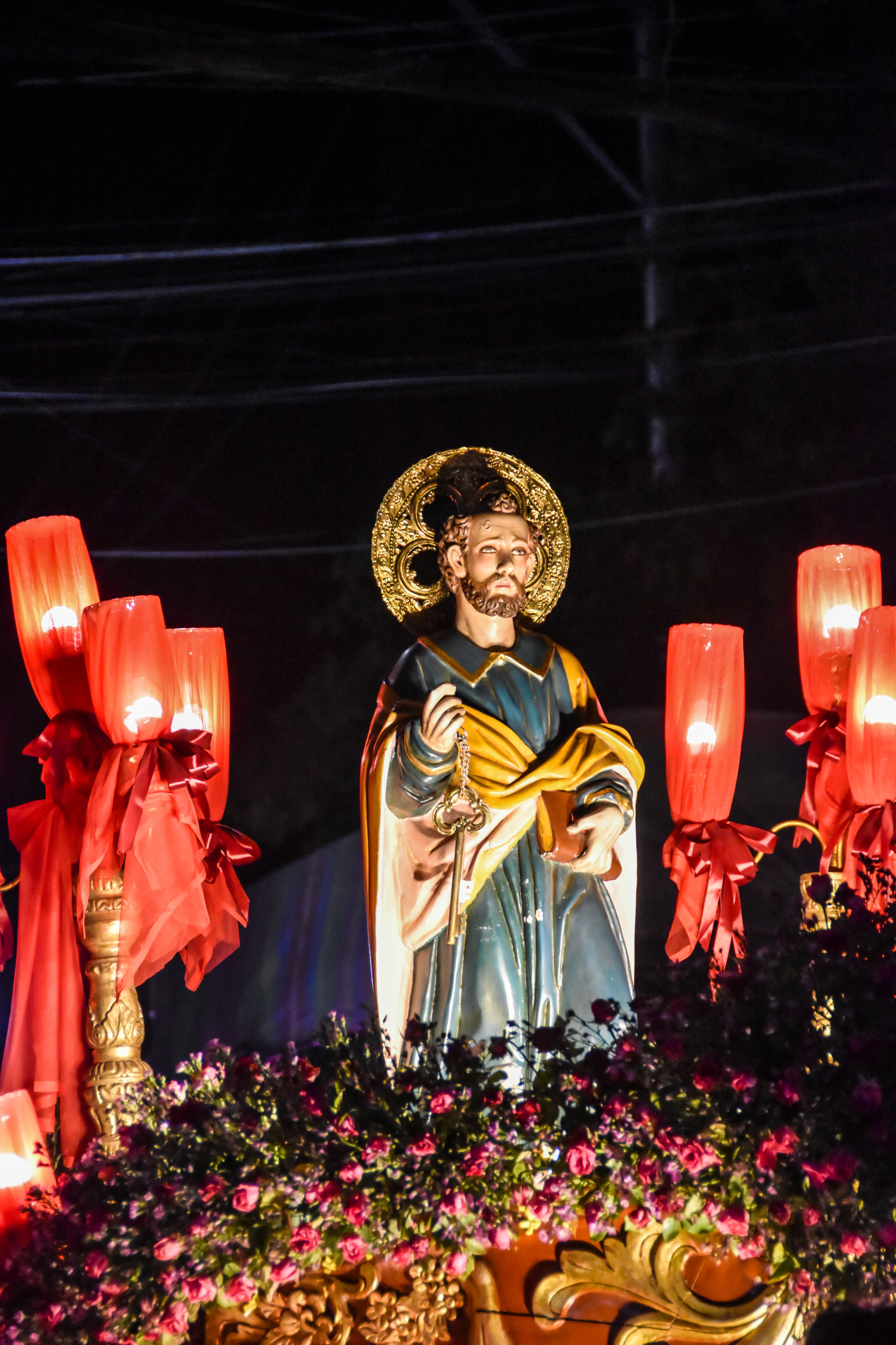 A illuminated statue in a religious procession during a feast day in Guiguinto, Philippines.