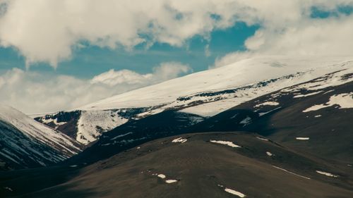 Free Beautiful snowy mountains in Kars, Türkiye, capturing the serene winter scenery. Stock Photo