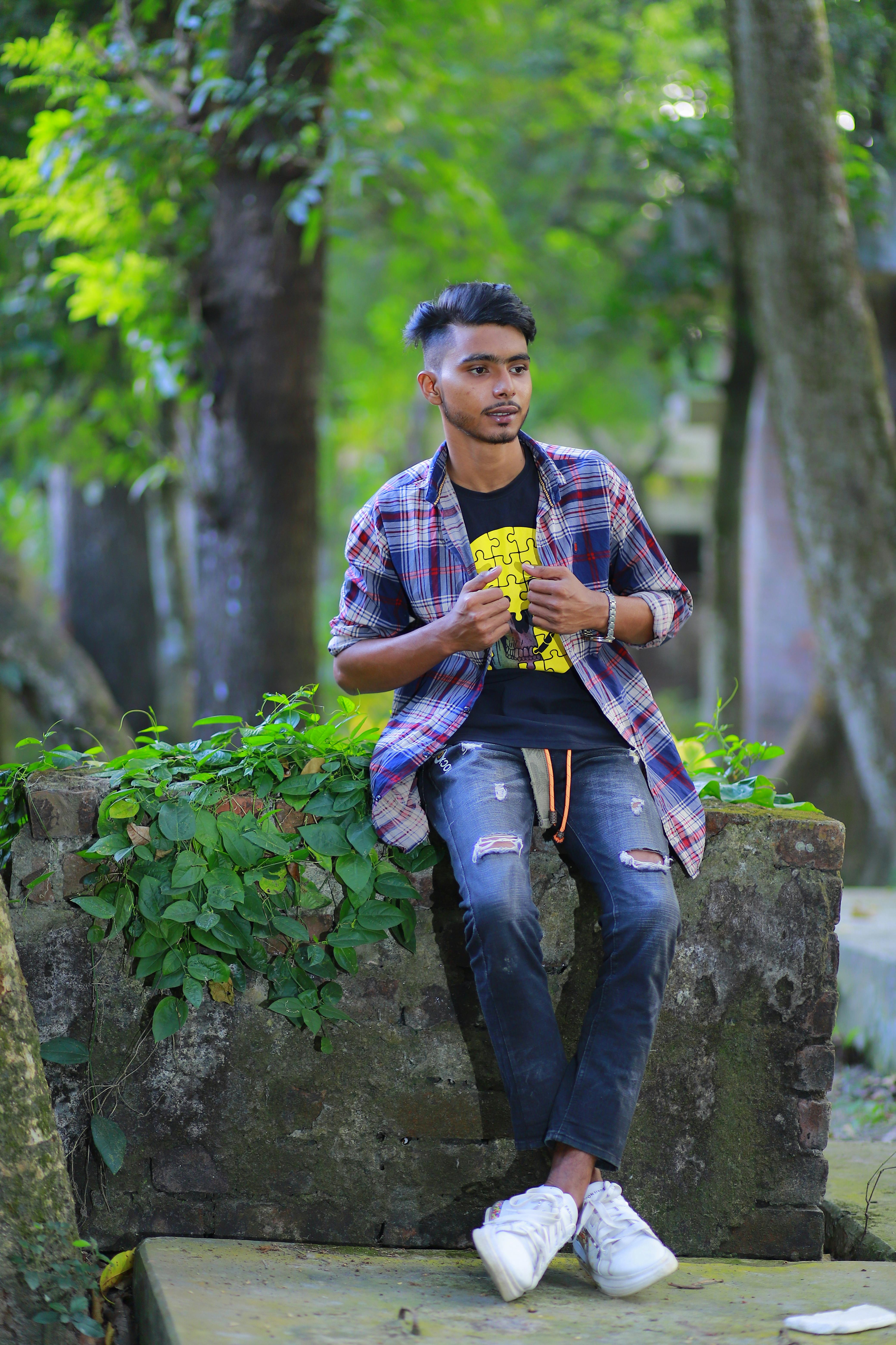 Young man in casual attire posing outdoors in Brahmanbaria, Bangladesh.