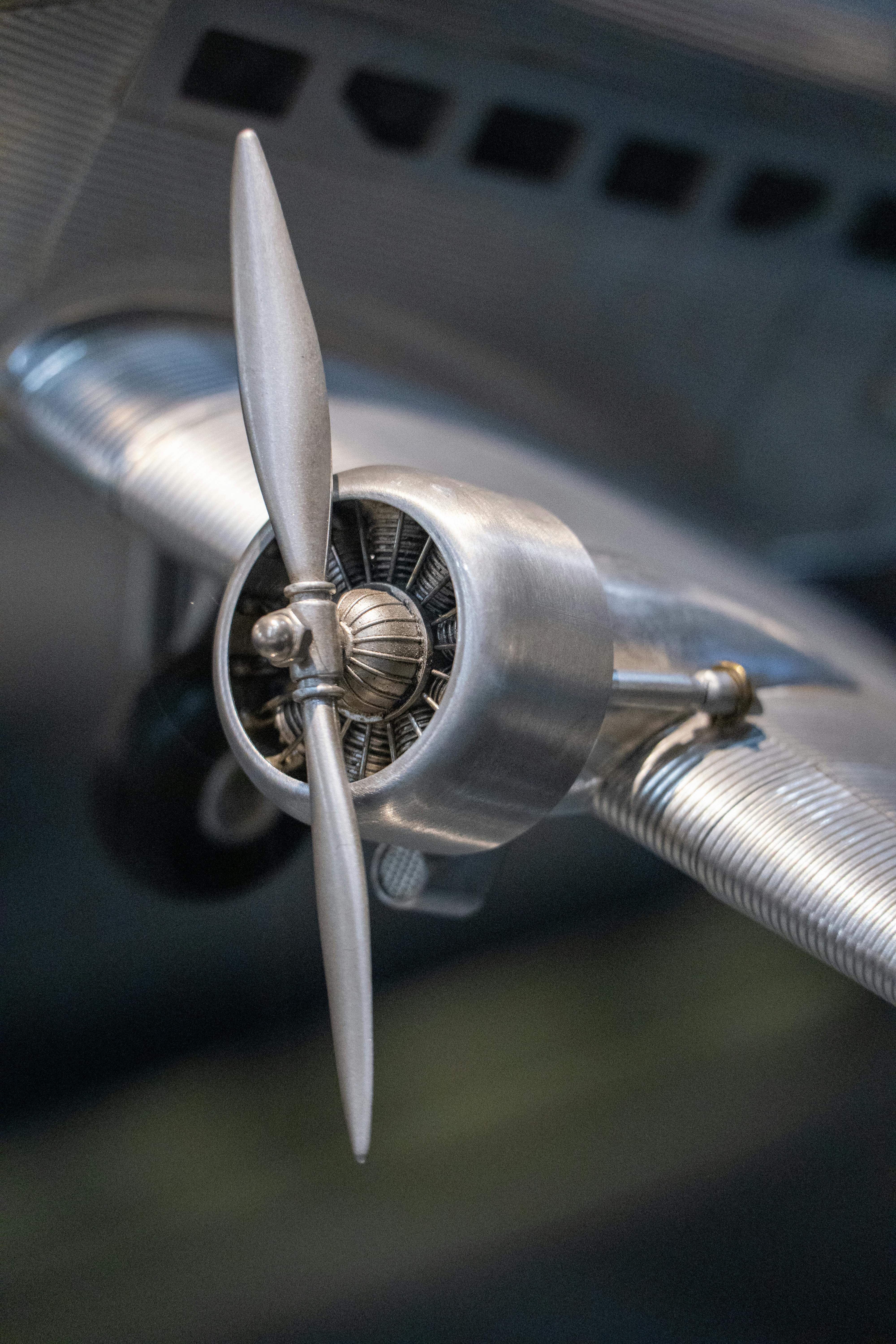 Detailed image of a vintage airplane propeller showcasing mechanical design.