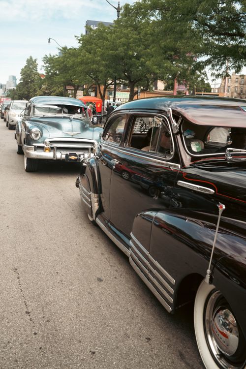 Free A collection of classic vintage cars lined up on an urban street in Chicago, Illinois. Stock Photo