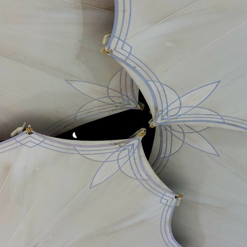 Free Intricate design of large retractable umbrellas in Medina, Saudi Arabia. Stock Photo
