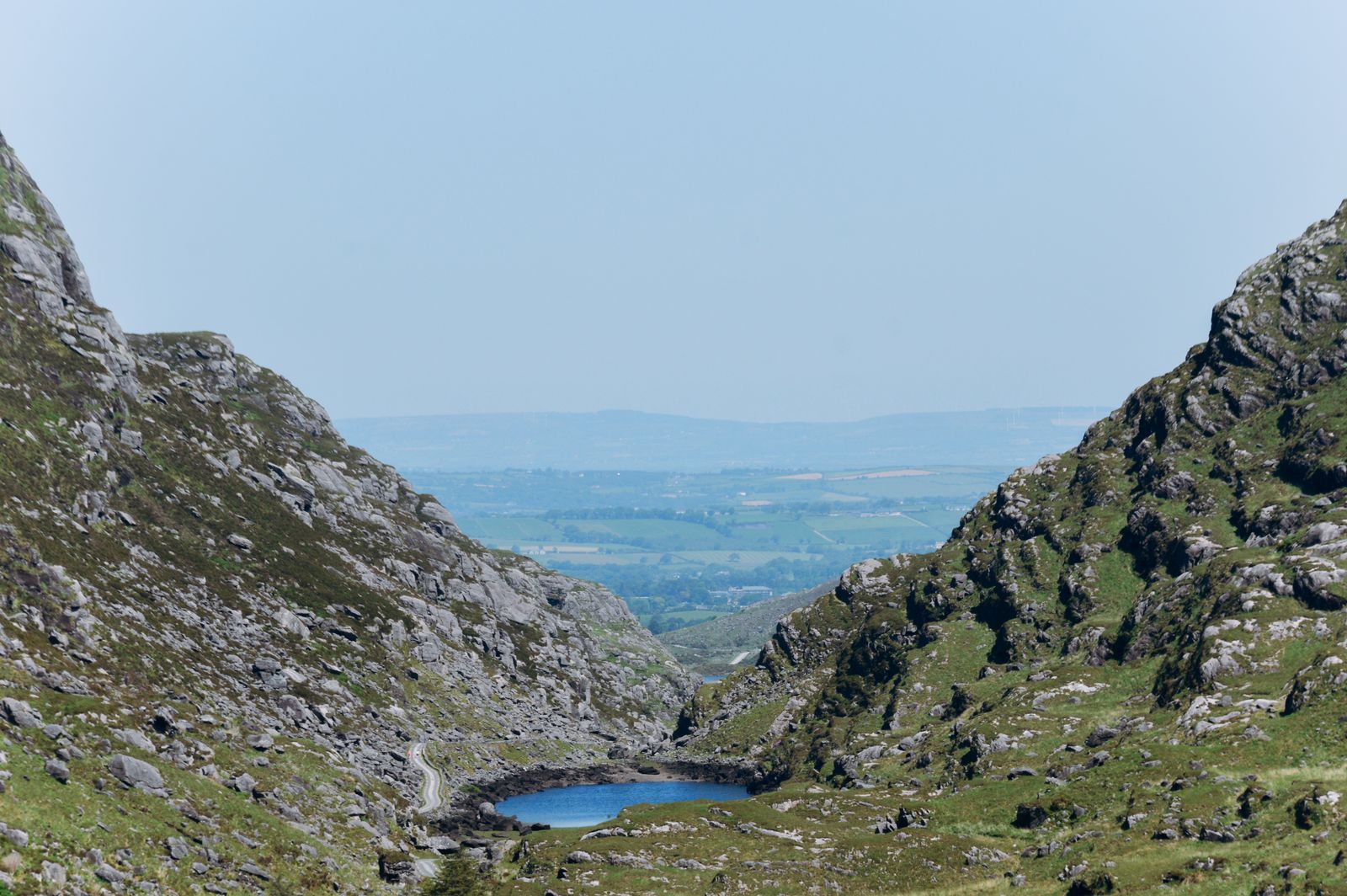 Mountainous landscape of Gap of Dunloe, Ireland captured in bright daylight