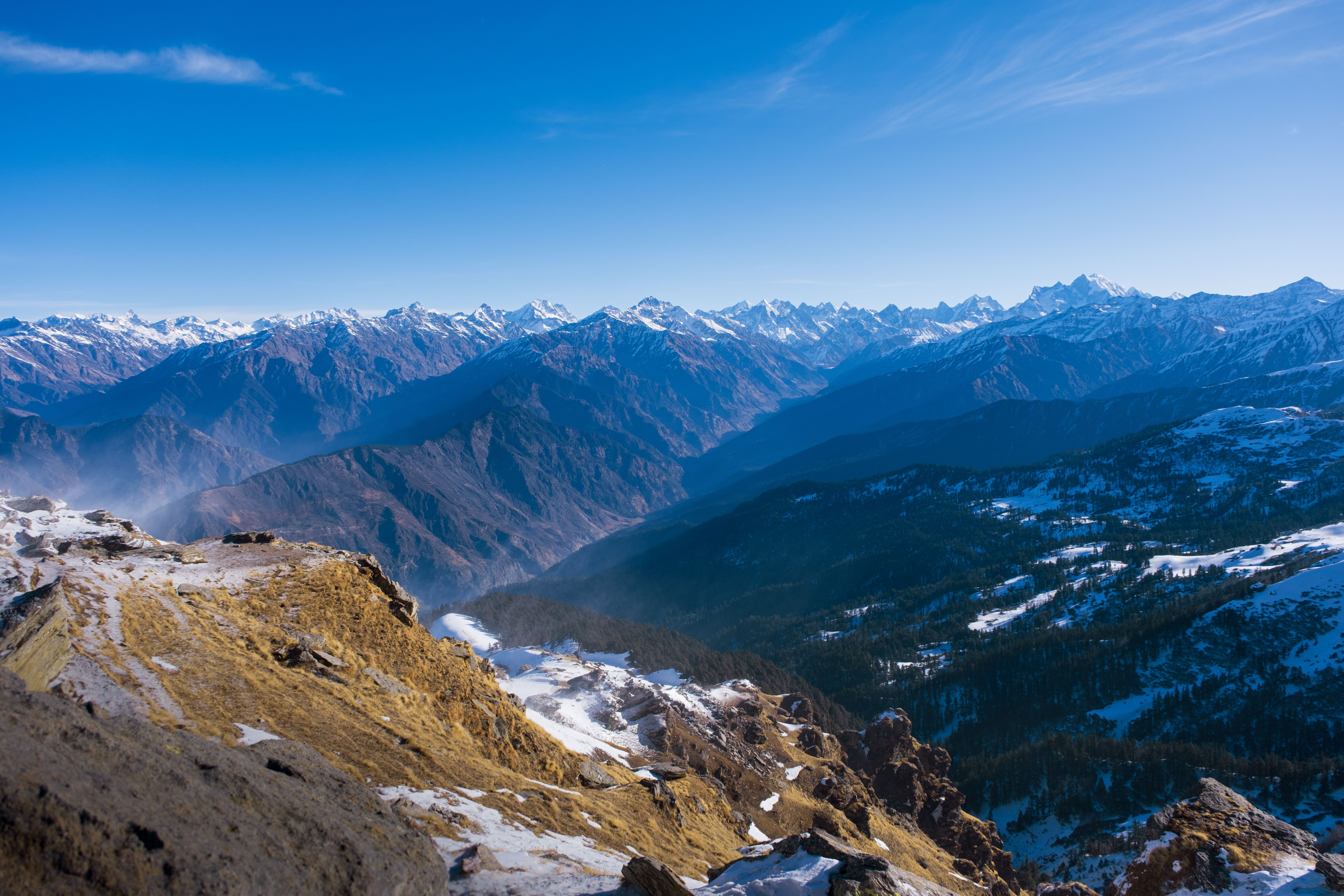 Breathtaking view of the snow-capped Himalayan mountains in Singtur Range, Uttarakhand, India.