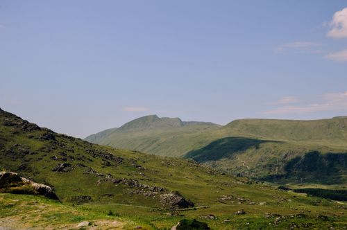 Free Breathtaking view of the lush green mountains and blue sky in Killarney, Ireland. Stock Photo
