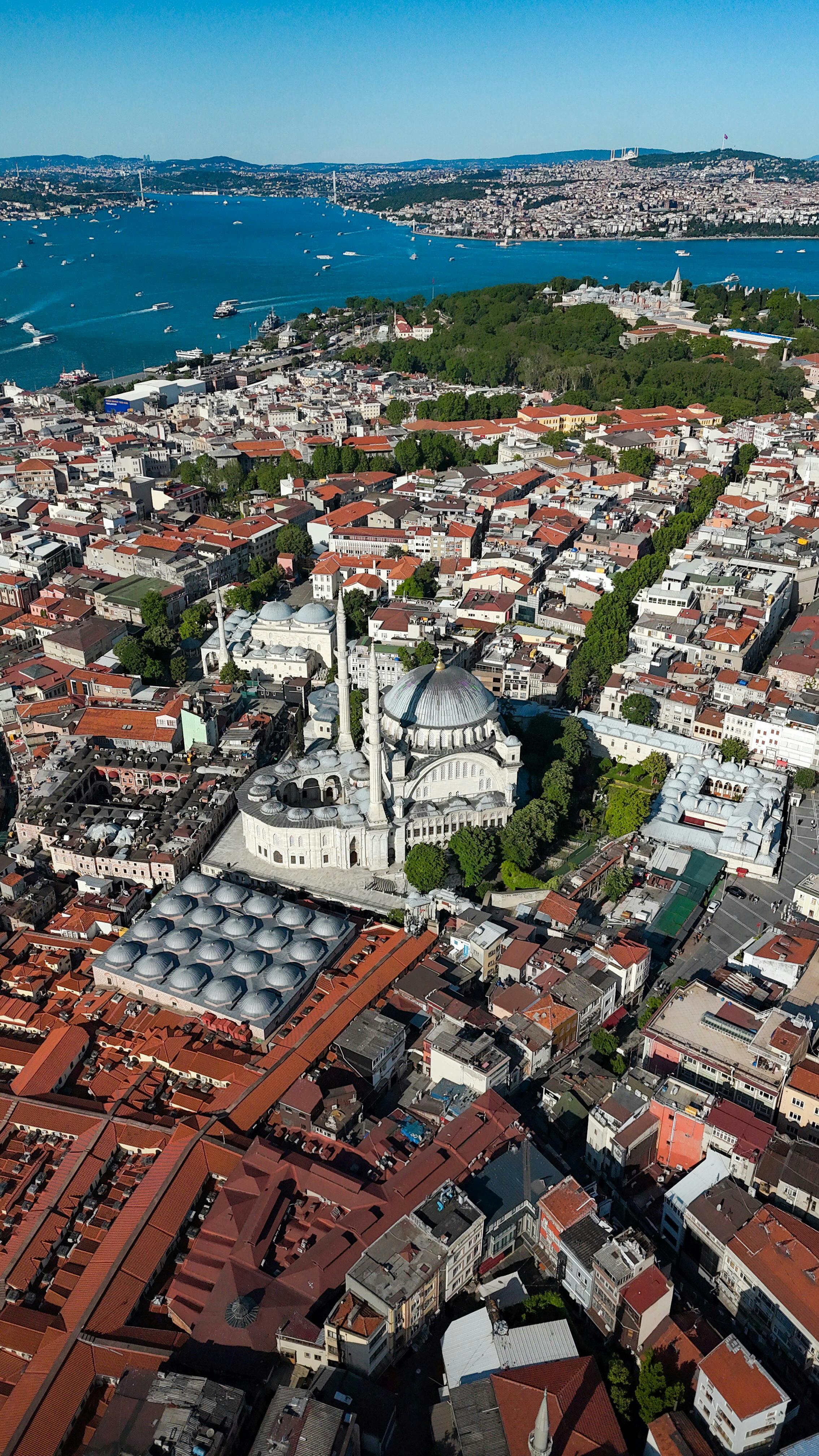 Stunning aerial shot of Istanbul's Sultanahmet district with mosque, Bosphorus view. Perfect for travel and architecture themes.