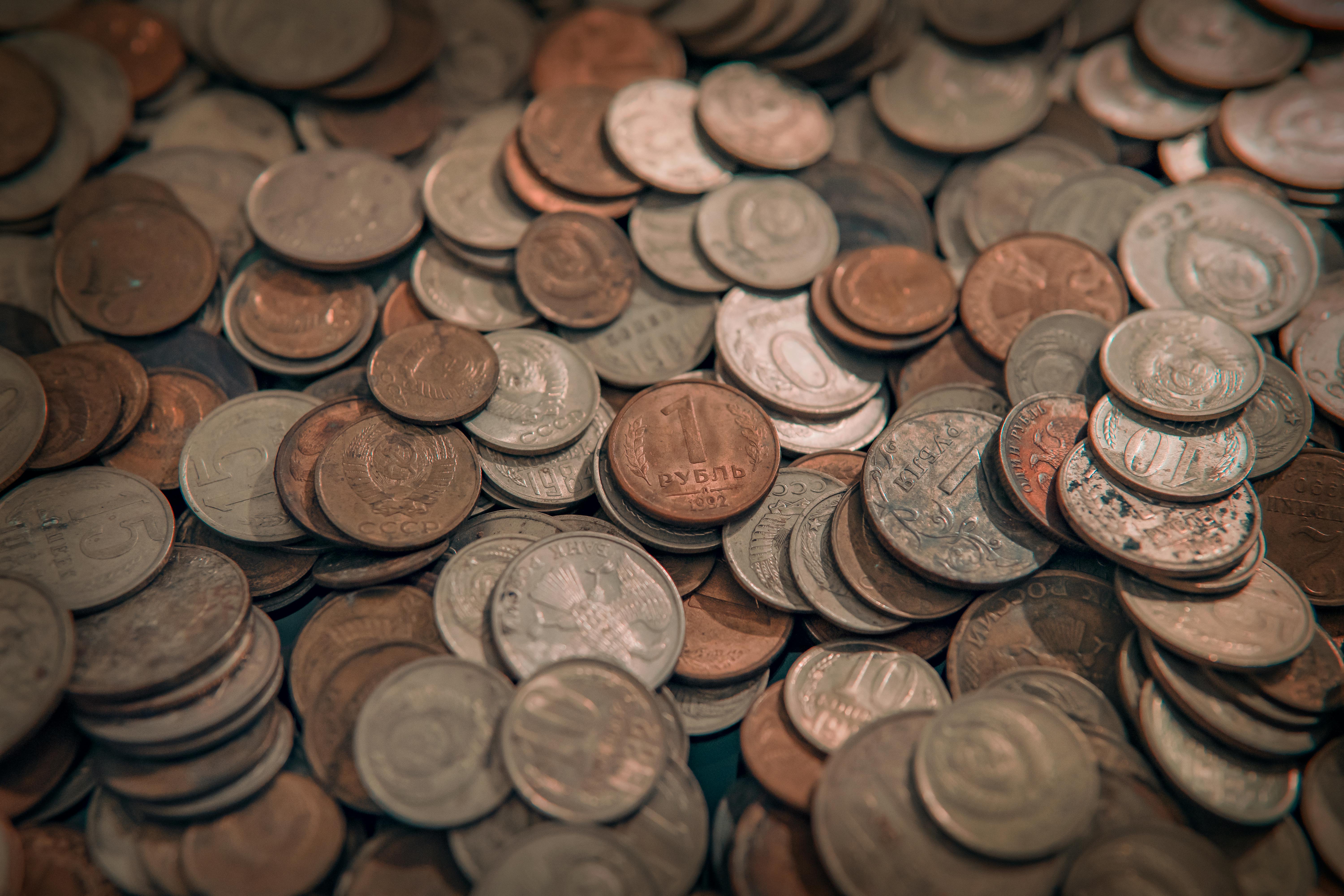 silver and gold round coins