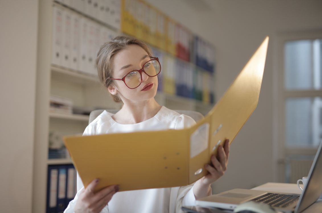 lab manager reviewing paperwork
