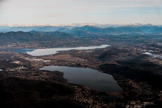 Breathtaking view of lakes near mountains under serene sky