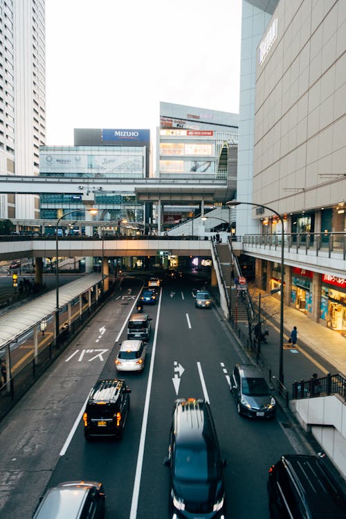 Cars on Road Near Building