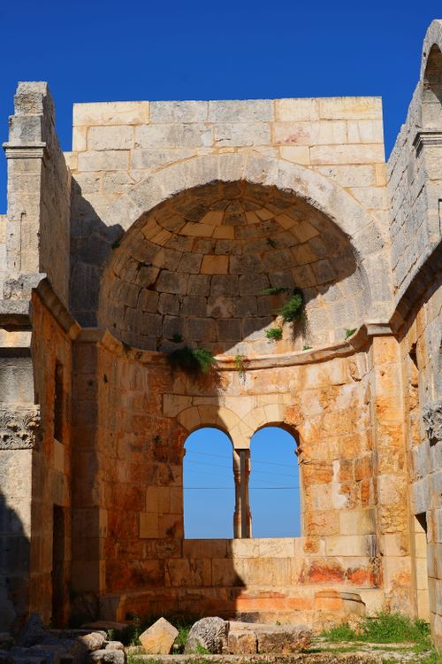 Free Explore the ancient Byzantine church ruins with its stunning arches and dome under a clear blue sky. Stock Photo