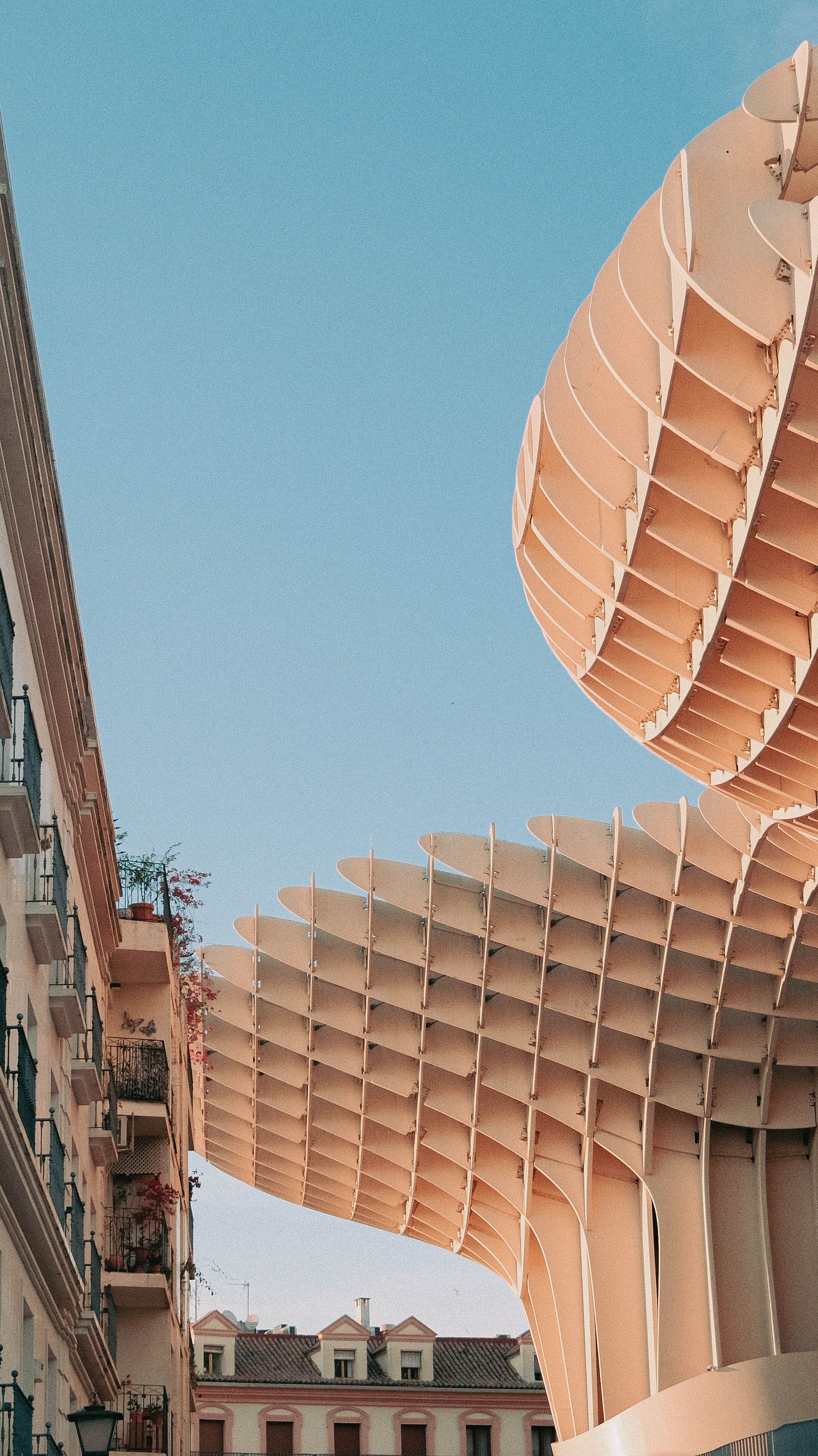 Unique architectural structure of Metropol Parasol exhibited on a sunny day in Seville, Spain.