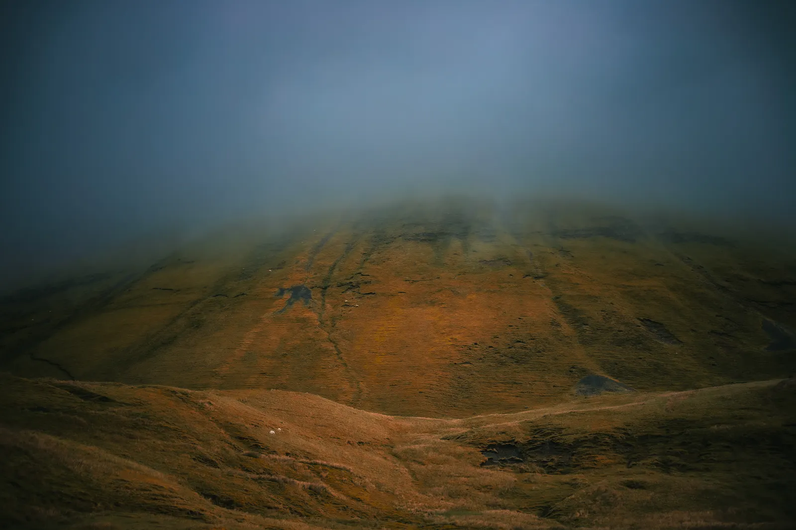 Mist over rolling green hills, Outer Hebrides