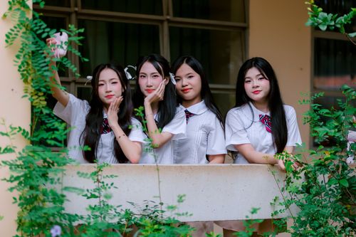 Teenage girls in school uniforms posing outdoors · Free Stock Photo