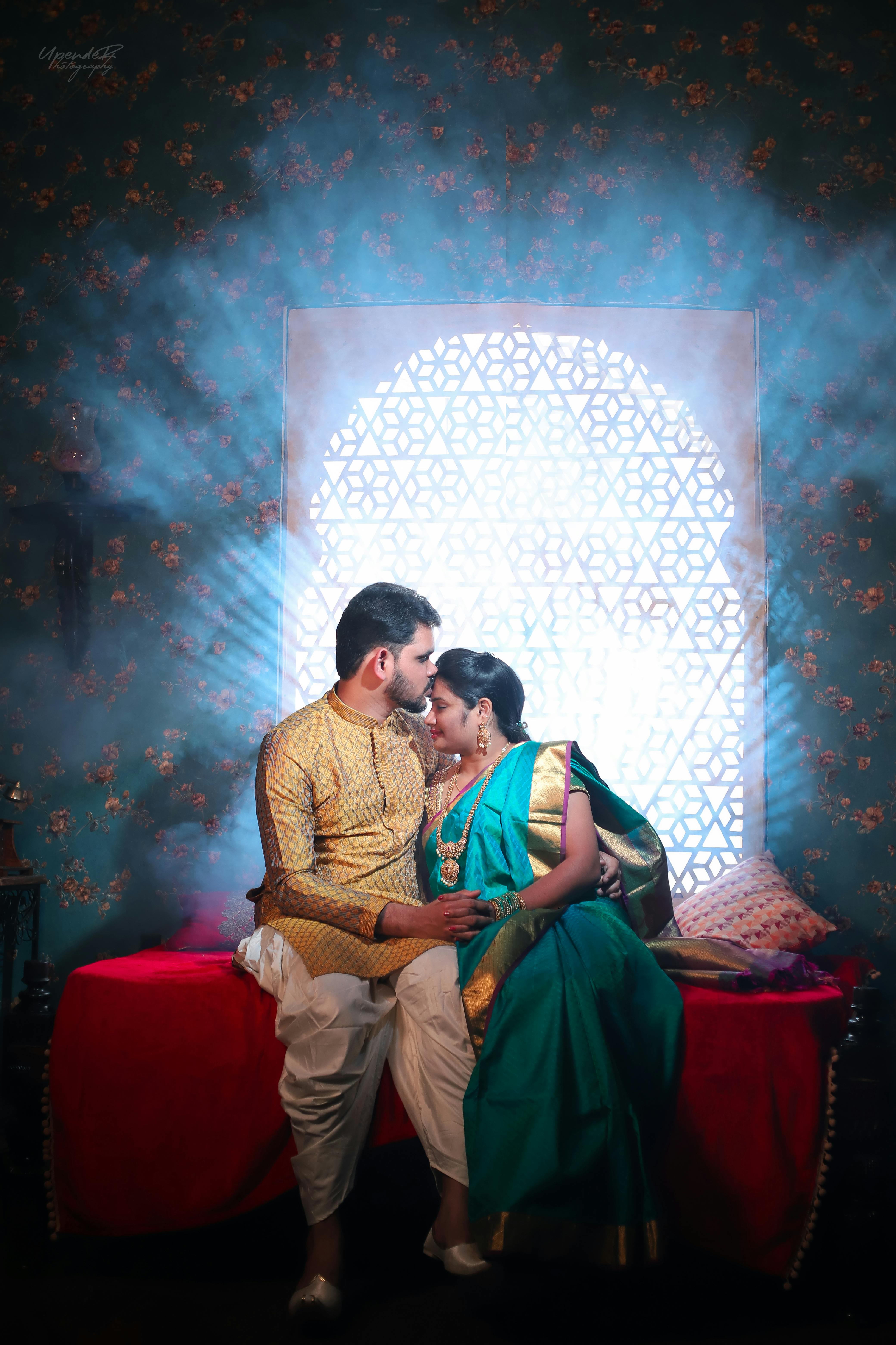 Intimate pre-wedding shoot of an Indian couple in Hyderabad, showcasing traditional attire and love.