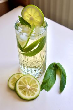 Fresh lime and mint iced drink perfect for summer refreshment.