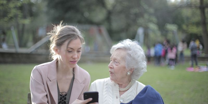 Caregiver communicating with loved one with Parkinson's