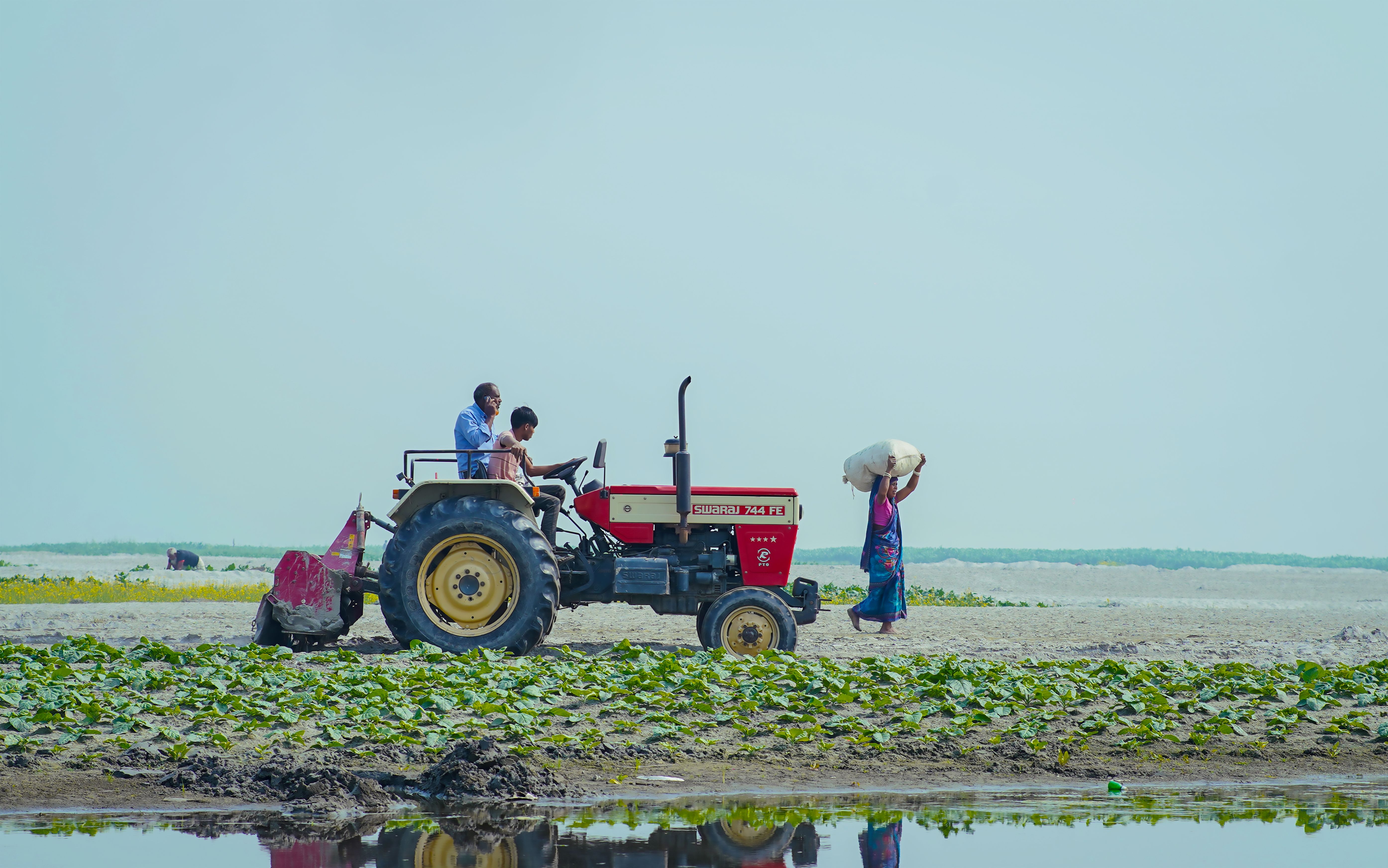 Rural Farming Scene with Tractor and Workers in Bangladesh · Free Stock ...