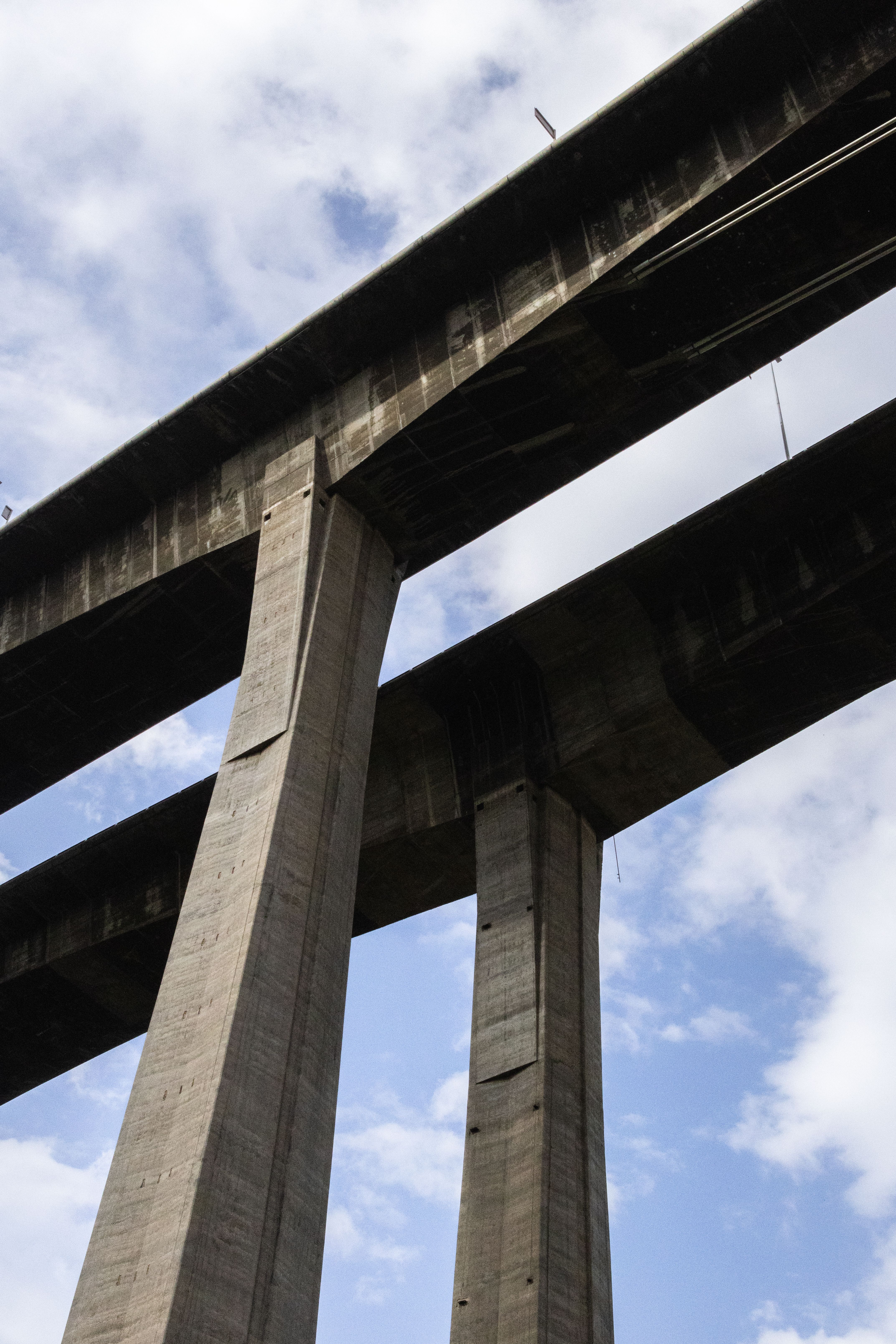 Dramatic Underside View of Concrete Bridge Structure · Free Stock Photo