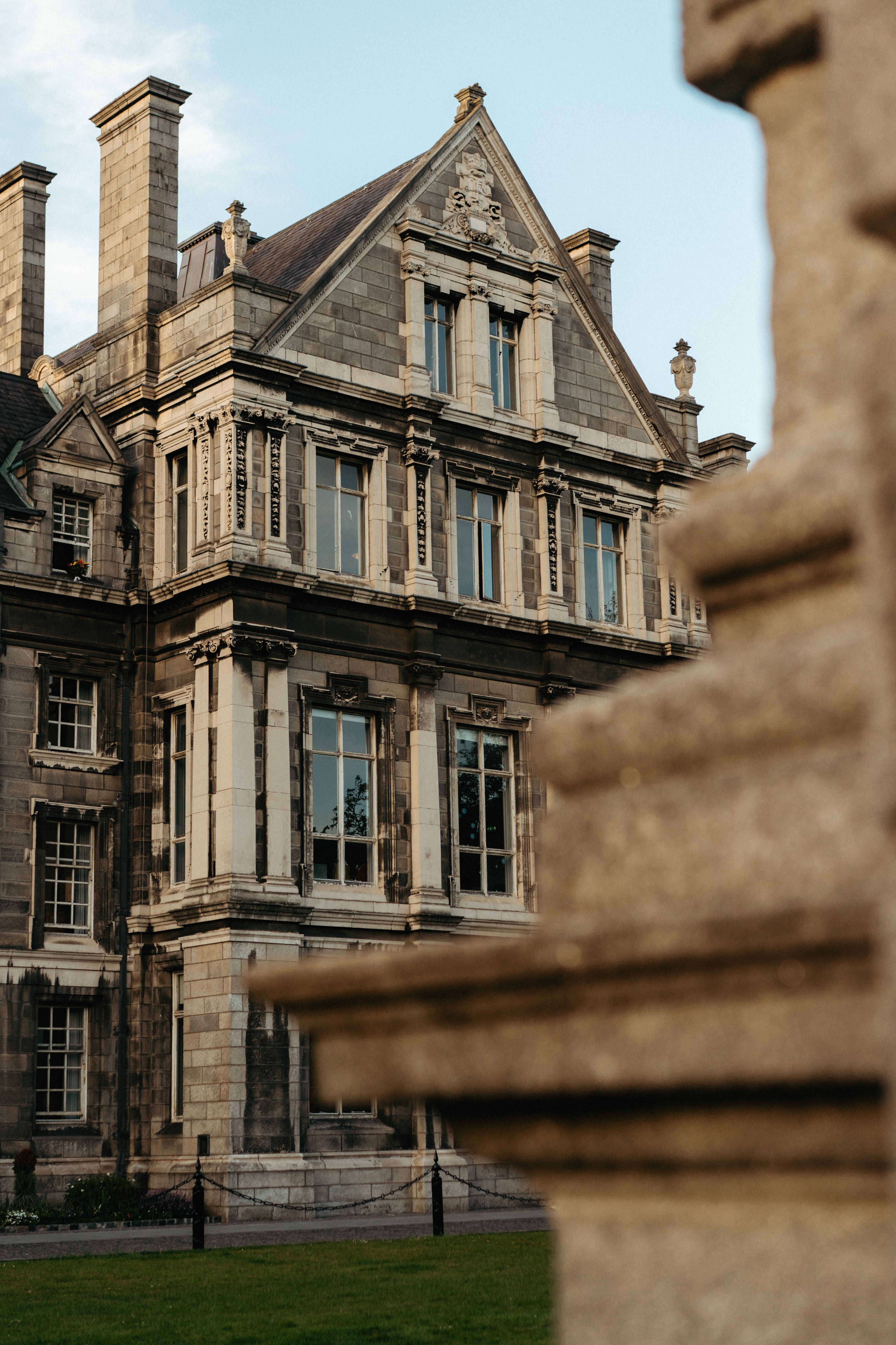 Classic architecture of a historic building in Dublin with intricate details at sunset.